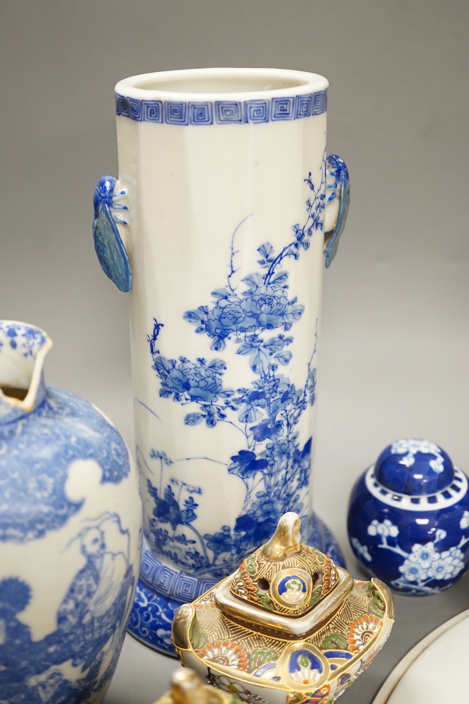 A group of 20th century Chinese and Japanese ceramics, including a blue and white circular plaque, 31 cm diameter